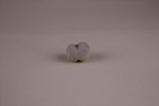 商圆形凹槽夹细砂灰褐陶网坠