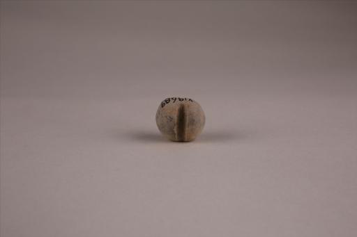 商圆形凹槽夹细砂黄褐陶网坠