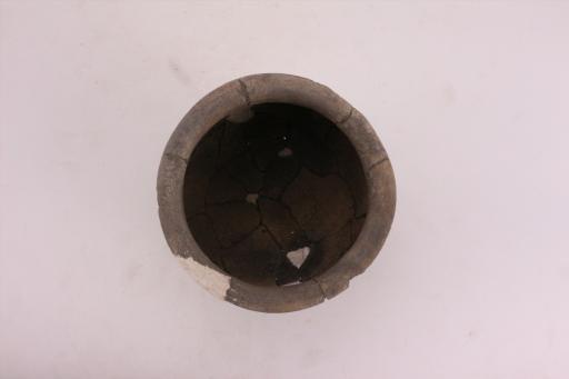 新石器时代屈家岭文化鼓腹平底斜条纹褐陶罐