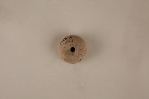 新石器时代大溪文化算珠形中穿夹细砂红褐陶纺轮