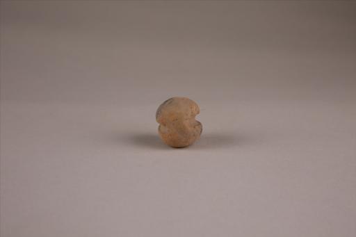 商椭圆形凹槽夹细砂红褐陶网坠