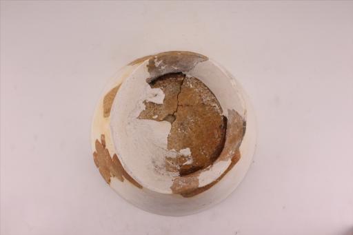 新石器时代城背溪文化侈口弧腹圈足绳纹红陶碗