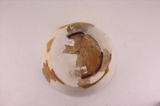 新石器时代城背溪文化侈口弧腹圈足绳纹红陶碗