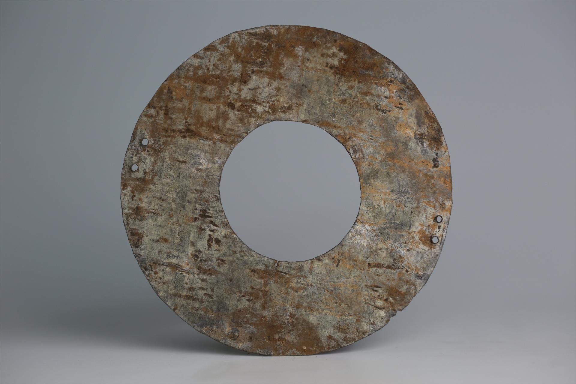 春秋时期四孔璧形锡饰片