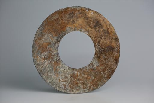 春秋时期四孔璧形锡饰片