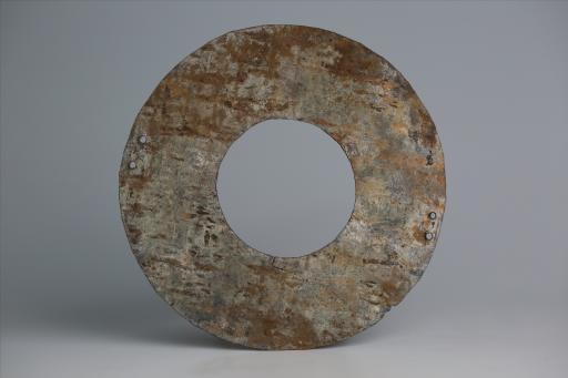 春秋时期四孔璧形锡饰片