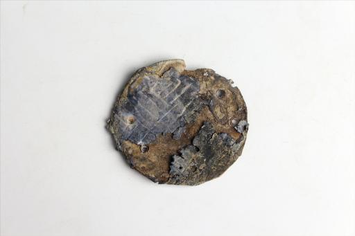 春秋时期圆形包锡箔锡饰片