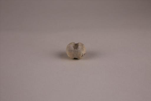 商圆形凹槽夹细砂黄褐陶网坠