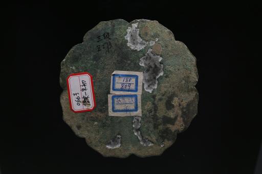 宋六搏人文故事菱花铜镜