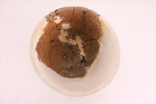 新石器时代城背溪文化侈口斜弧腹平底绳纹夹砂褐陶罐