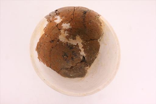 新石器时代城背溪文化侈口斜弧腹平底绳纹夹砂褐陶罐