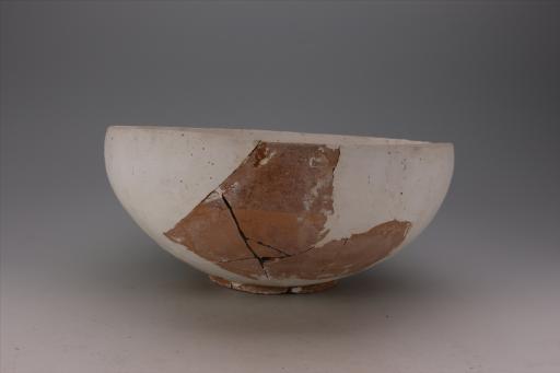 新石器时代大溪文化敛口弧腹假圈足泥质红陶碗