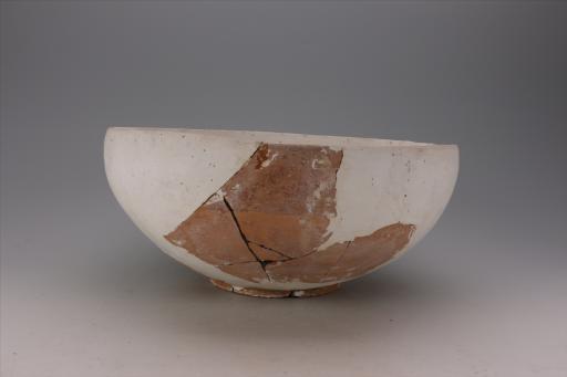 新石器时代大溪文化敛口弧腹假圈足泥质红陶碗