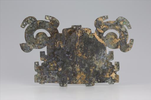 春秋时期巨眼兽面形铜饰片