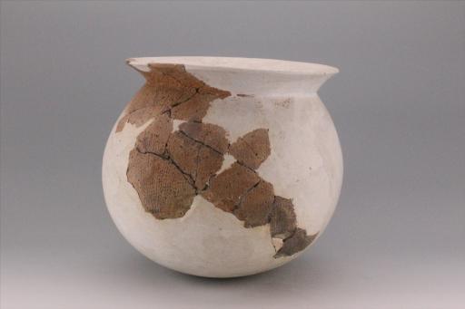 新石器时代城背溪文化鼓腹圜底绳纹夹砂褐陶釜