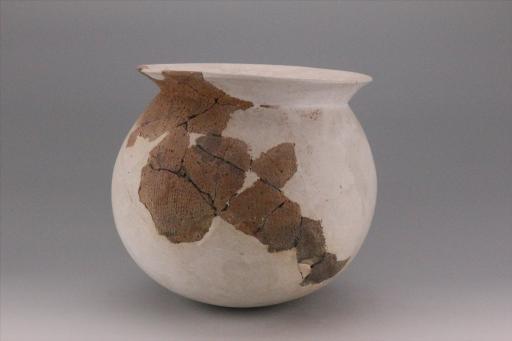 新石器时代城背溪文化鼓腹圜底绳纹夹砂褐陶釜