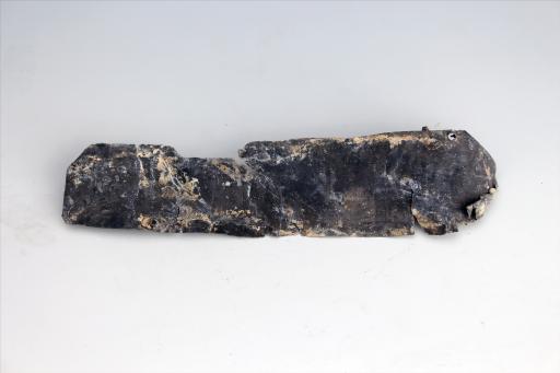 春秋时期长梯形包锡箔锡饰片