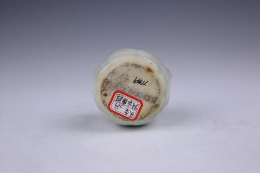 清广肩莲瓣腹管状流青白釉瓷执壶
