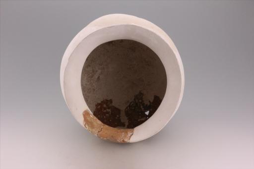 新石器时代城背溪文化鼓腹圜底绳纹夹砂褐陶釜
