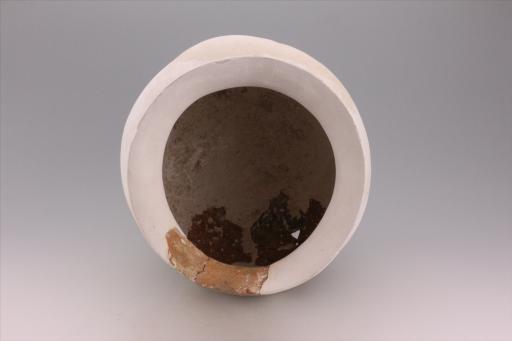 新石器时代城背溪文化鼓腹圜底绳纹夹砂褐陶釜