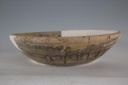 宋直口平底植物纹米黄釉陶盆