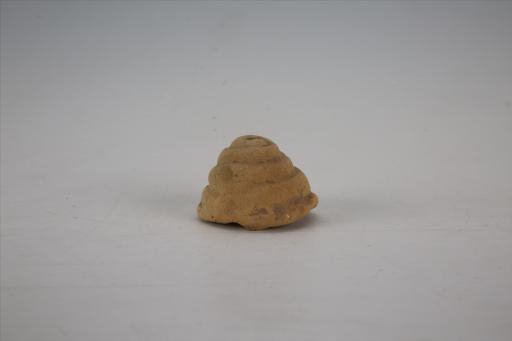 唐夹砂灰黄陶泥塑佛螺髻
