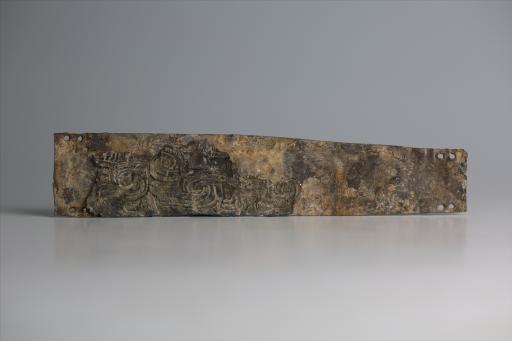 春秋时期长梯形勾连蟠虺纹锡饰片