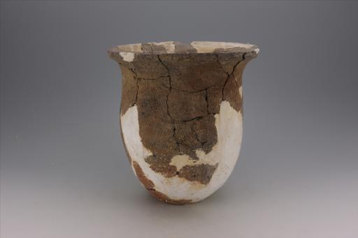 商深腹斜绳纹夹砂黄褐陶罐