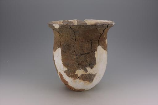 商深腹斜绳纹夹砂黄褐陶罐