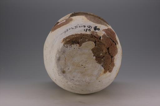 商深腹斜绳纹夹砂黄褐陶罐