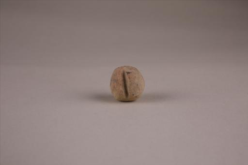 商圆形凹槽夹细砂黄褐陶网坠