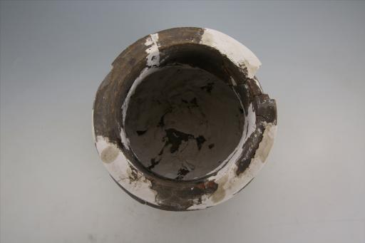 战国时期直口鼓腹小凹底粗绳纹泥质黄褐黑皮陶罐