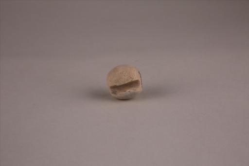 商圆形凹槽夹细砂黄褐陶网坠