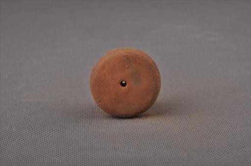 新石器时代屈家岭文化圆饼形中穿夹砂红褐陶纺轮