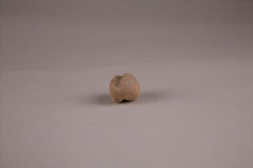 商椭圆形凹槽夹细砂红褐陶网坠
