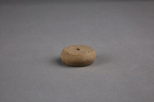 商算珠形中穿夹砂黄褐陶纺轮
