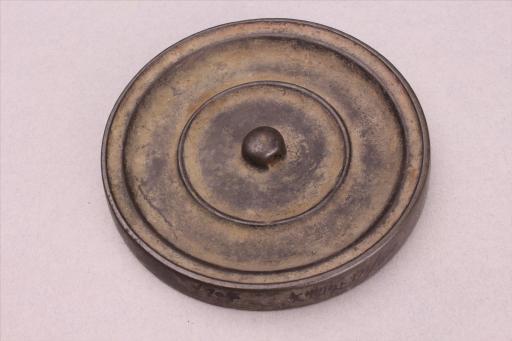 明圆钮铜镜