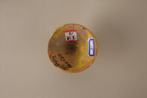 商圆形泥质橙黄陶器盖