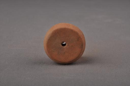 新石器时代大溪文化圆饼形中穿夹砂红褐陶纺轮