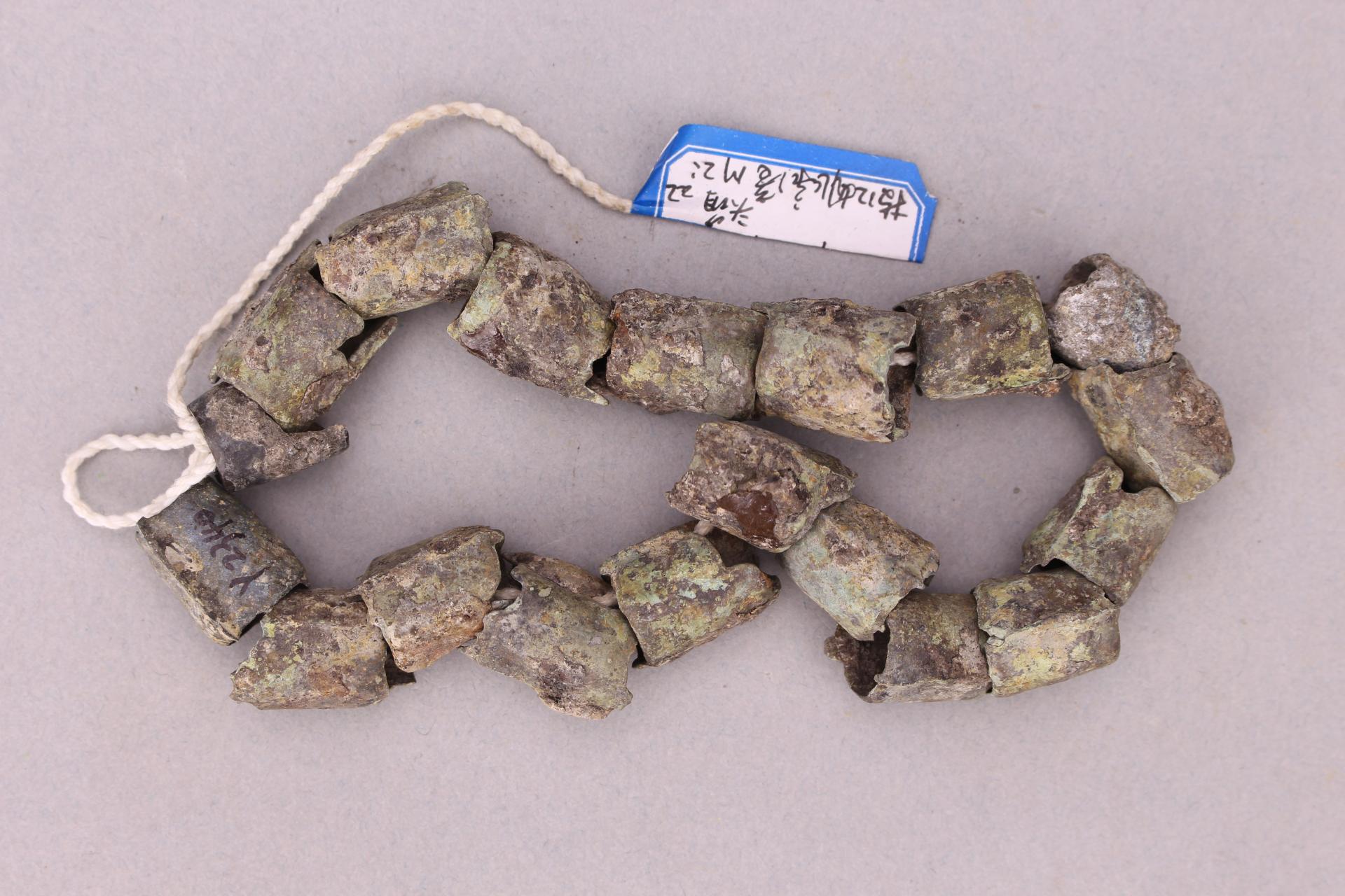 战国时期圆形马头饰