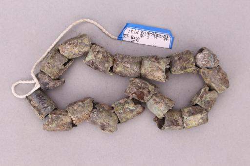 战国时期圆形马头饰