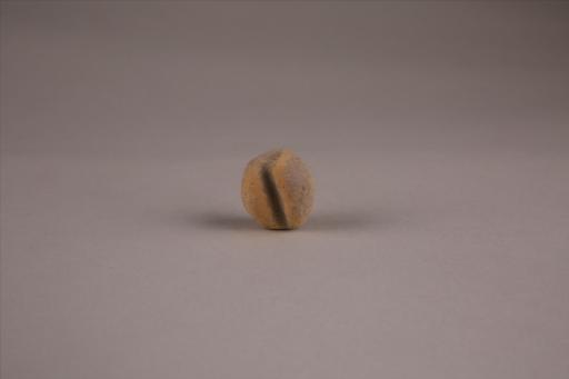 商圆形凹槽夹细砂黄褐陶网坠