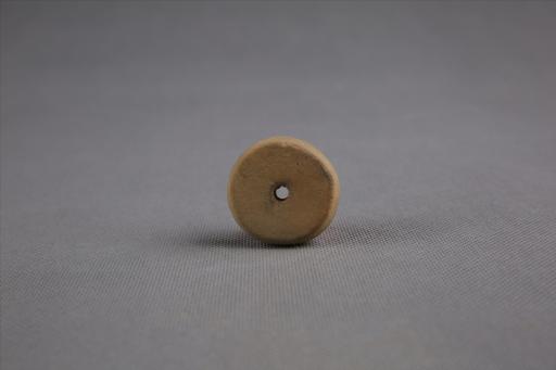 商算珠形中穿夹砂黄褐陶纺轮