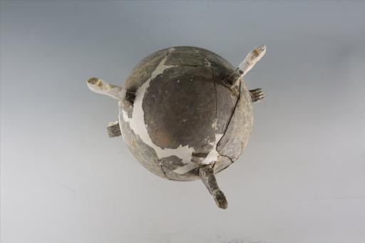 战国时期椭圆形子母敛口对称环纽变异鹿状纽足泥质褐陶敦