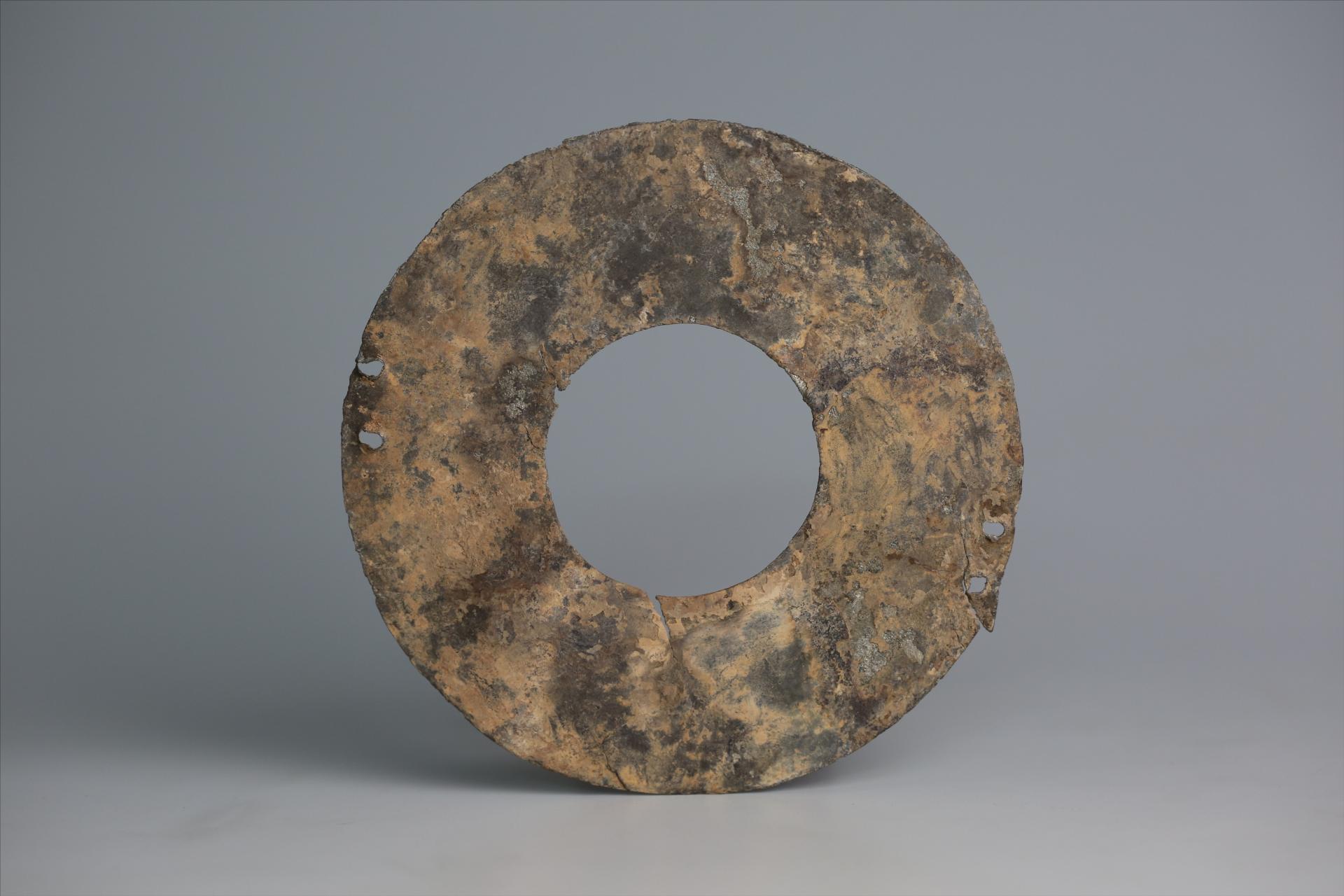 春秋时期四孔璧形锡饰片