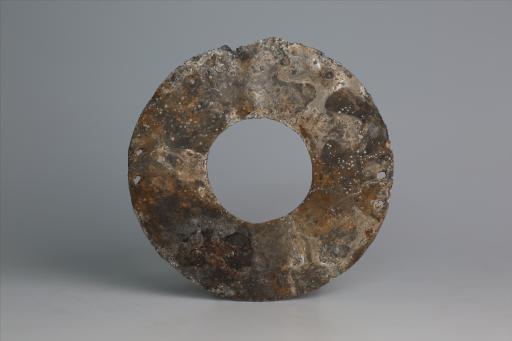 春秋时期四孔璧形锡饰片