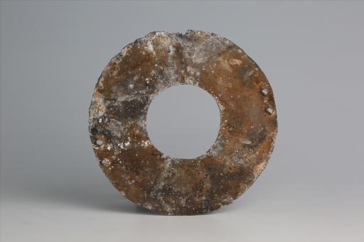 春秋时期四孔璧形锡饰片