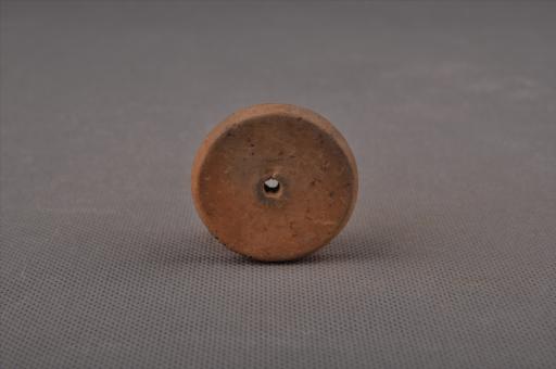 新石器时代屈家岭文化圆饼形中穿夹砂红褐陶纺轮