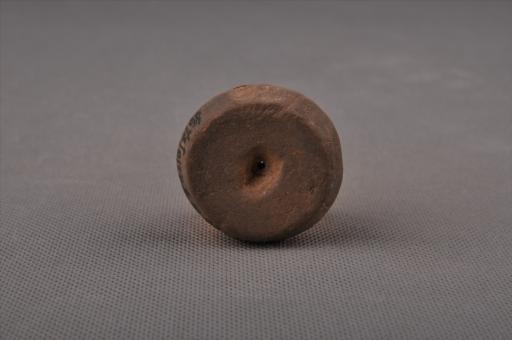 新石器时代大溪文化算珠形中穿夹细砂灰褐陶纺轮
