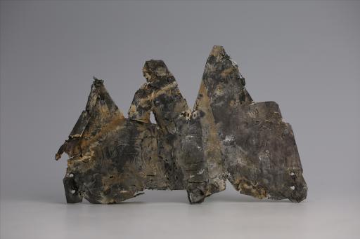 春秋时期兽形三尾包锡箔锡饰片